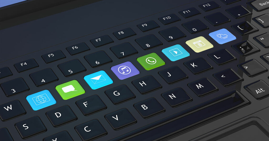 Black keyboard closeup with apps icons shortcuts